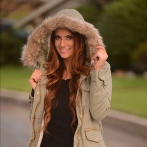 Olive green jacket with fur hood